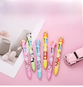 Gros plan de stylos cartoon 6 couleurs avec figurines d'animaux et décorations roses
