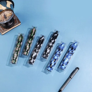 Detail of missile shaped pens in camouflage patterns and independent gift box packaging