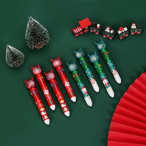 Detail of 10-color Christmas ballpoint pen with sequin snow globe and holiday patterns
