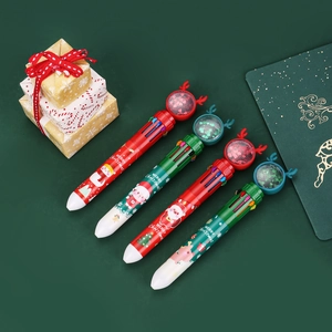 Detail of 4 Christmas 10-color ballpoint pens with sequin reindeer toppers and holiday prints