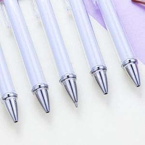 Minimalist white retractable ballpoint pen set with silver metal tip and sleek design