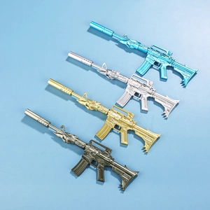 Detail view of four rifle-shaped metal pens with dragon patterns in multiple metallic colors