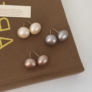 Elegant frosted pearl stud earrings set in cream white metallic grey and coffee gold