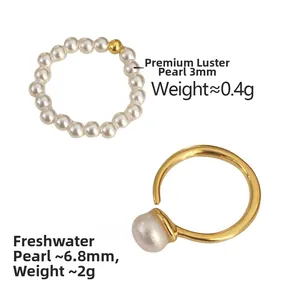 Close-up of high-luster freshwater pearl rings with beaded and golden open-band designs