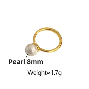 Detail of 8mm shell pearl ring weighing 1.7g with minimalist golden open band