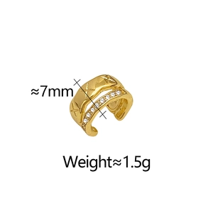 Detailed view of gold plated quilted ear cuff with star engraving and micro zircons
