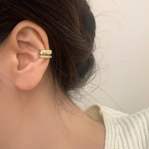 Golden double-layer ear cuff with textured metal and micro-pave zircons for women