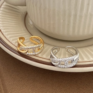 Adjustable chain ring with white zircon pave setting in gold and silver finish