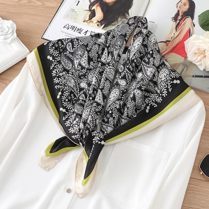 70cm Paisley square silk scarf in black and white with contrast border on white shirt