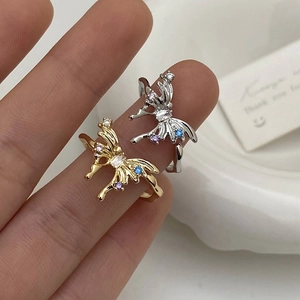 Bagues papillon irrégulières en or et argent avec ailes serties de cristaux colorés