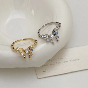 Bagues papillon irrégulières en or et argent avec accents de zircons colorés