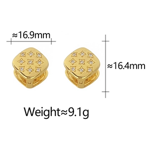 Macro detail of gold square hoop earrings with quilted texture and zircon inlay