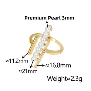 Detail view of gold ring with 3mm pearls and zircon insets including size measurements