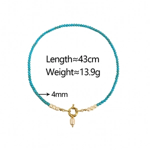 Detail of turquoise and pearl necklace showing 43cm length and 13.9g weight specs