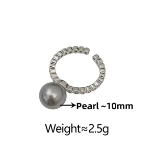 Detail of zircon-paved open ring with 10mm shell pearl showing weight and size