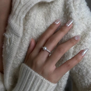 Elegant pearl open ring with cubic zirconia accents on a minimalist silver band