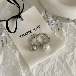 Elegant silver open ring with white and grey pearls and pavé cubic zirconia accents