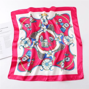 Detail of elegant silk square scarf with vintage carriage pattern and pink border
