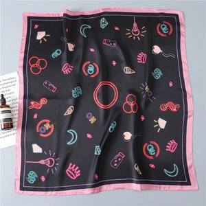 Detail of neon pattern silk satin square scarf with crown and diamond print motifs