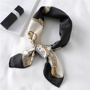Retro chain print silk scarf with gold and black patterns on white textured fabric