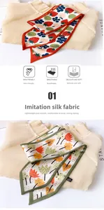 Detail view of skin-friendly silk-like scarves featuring floral and berry patterns