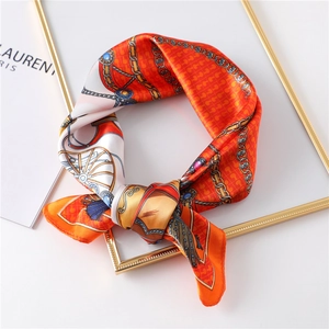 Classic chain and carriage print silk scarf in vibrant orange and blue color tones