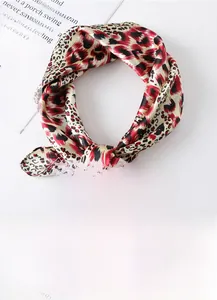 Detail of 60x60cm leopard print square scarf showing glossy silk satin texture and pattern