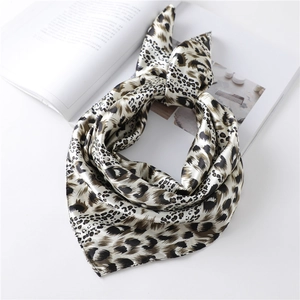 Elegant leopard print satin square scarf with a smooth finish and classic silk texture
