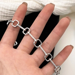 Minimalist silver chain bracelet featuring micro-paved cubic zirconia links for women