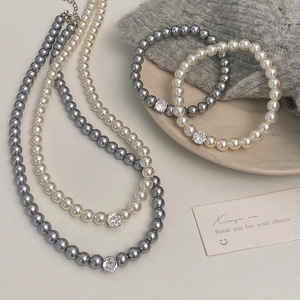 Collier Bracelet Et Bague Élégant Bijoux En Künstliche Perles D'imitation Avec Pendentif En Zircone Simple Polyvalent Pour Femmes