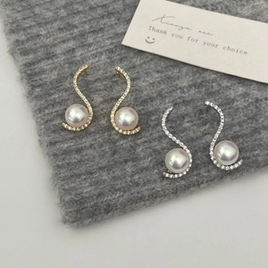 Elegant S-curve pearl earrings in gold and silver finish with zircon micro-paving