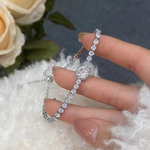 Close-up of adjustable silver bracelet with micro-paved cubic zirconia and sliding clasp