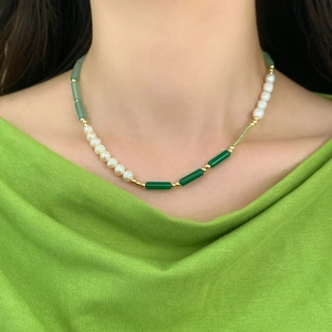 Handmade beaded necklace featuring freshwater pearls and green agate with gold accents