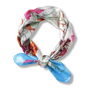 Floral print silk scarf for women featuring pink botanical patterns and a bright blue border