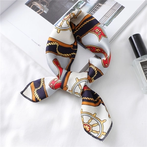 Detail of nautical print silk scarf with rope patterns and smooth satin texture