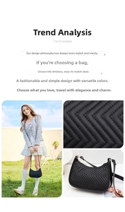 Detailed view of black quilted leather shoulder bag with fine stitching and gold hardware