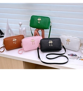Mini quilted PU leather shoulder bags with gold bird hardware in five vibrant colors