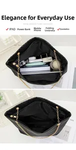 Spacious black quilted tote bag showing large interior capacity for daily essentials