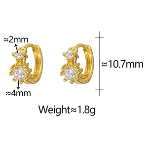Detail view of gold earrings featuring clear cubic zirconia in 2mm and 4mm sizes