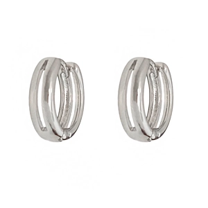 Minimalist silver triple-hoop earrings featuring a layered and stackable ring design