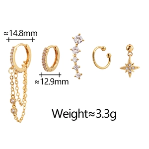 Detailed set of 5 gold moon and star earrings with cubic zirconia and chain tassel fringe