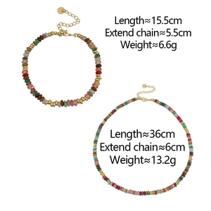 Detail of colorful natural stone beaded necklace and bracelet with gold-tone hardware