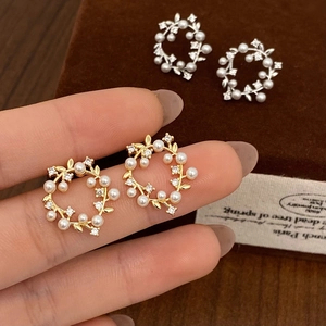 French vintage floral pearl stud earrings in gold and silver leaf design with zircons