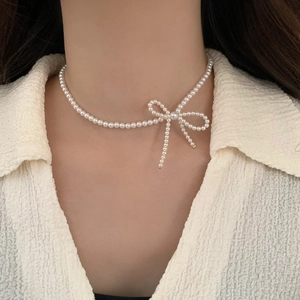 Elegant pearl necklace with delicate bow pendant, high-quality jewelry for women's daily wear
