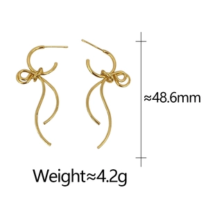 Detailed view of gold bow knot drop earrings showing size dimensions and weight metrics