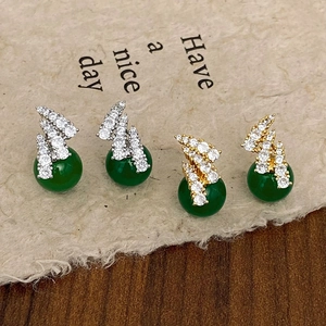 Vintage green chalcedony earrings set with zircon accents in gold and silver finish
