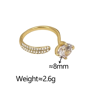 Detail view of gold adjustable ring with 8mm round zircon and pavé crystal accents