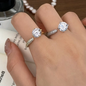 French style sparkling cubic zirconia engagement ring set in gold and silver finish
