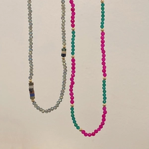 Handmade natural stone beaded necklaces in blue and pink with gold metal spacer beads