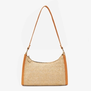 Minimalist straw shoulder bag with brown faux leather trim and woven texture design